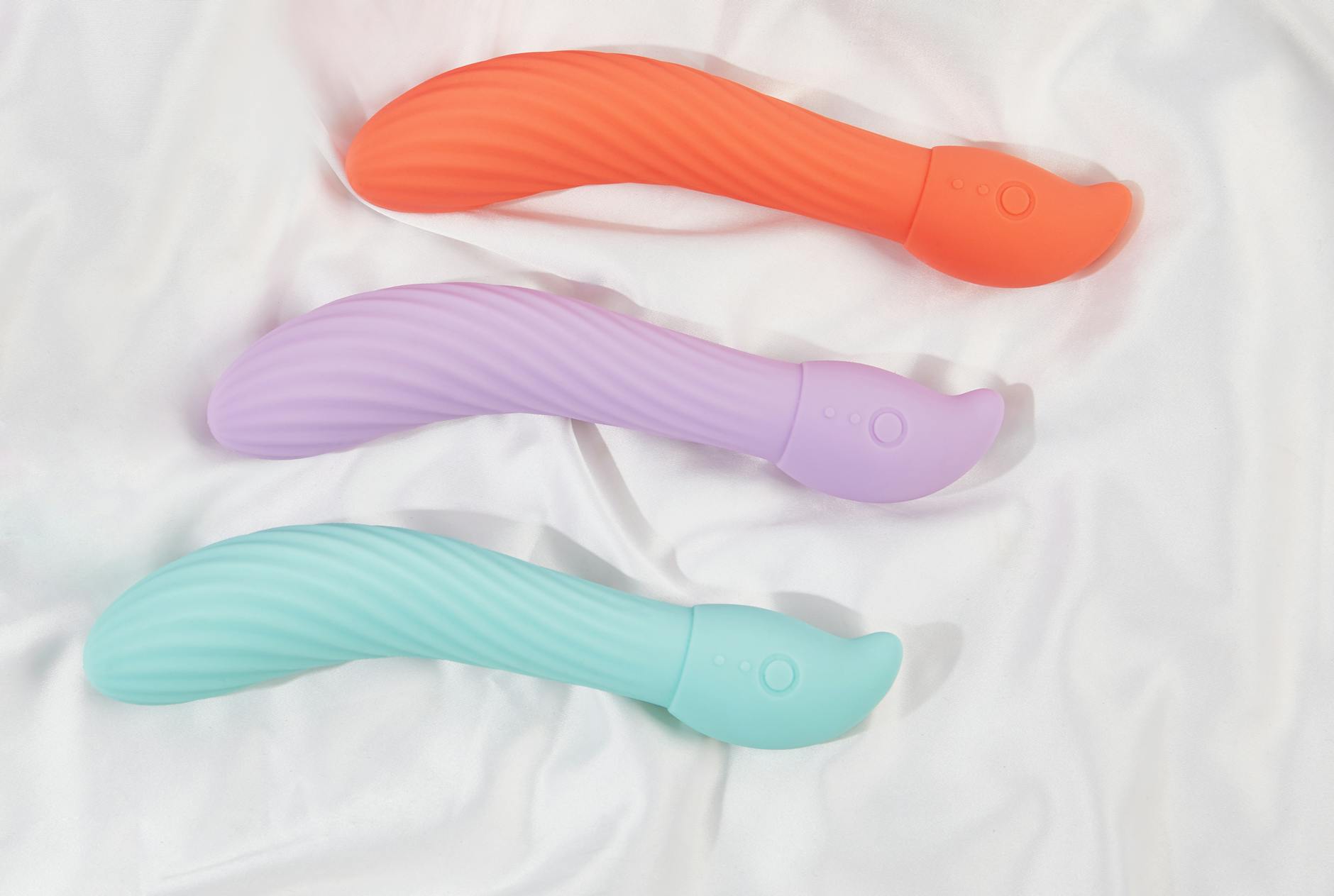 A couple holding a vibrator together, showing comfort and openness in modern intimacy