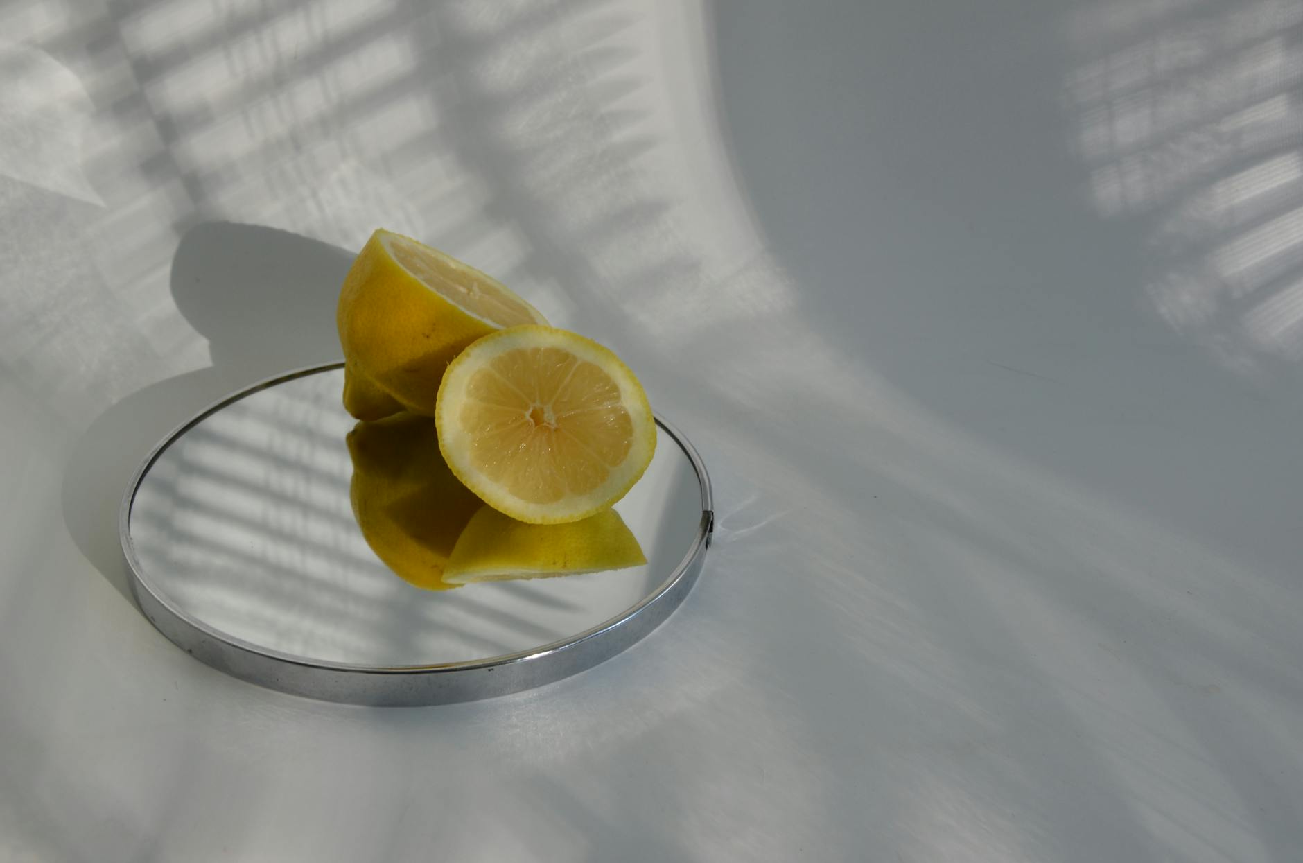 Colorful lemon vibrators arranged on a bright yellow surface, showcasing diverse designs and color options.